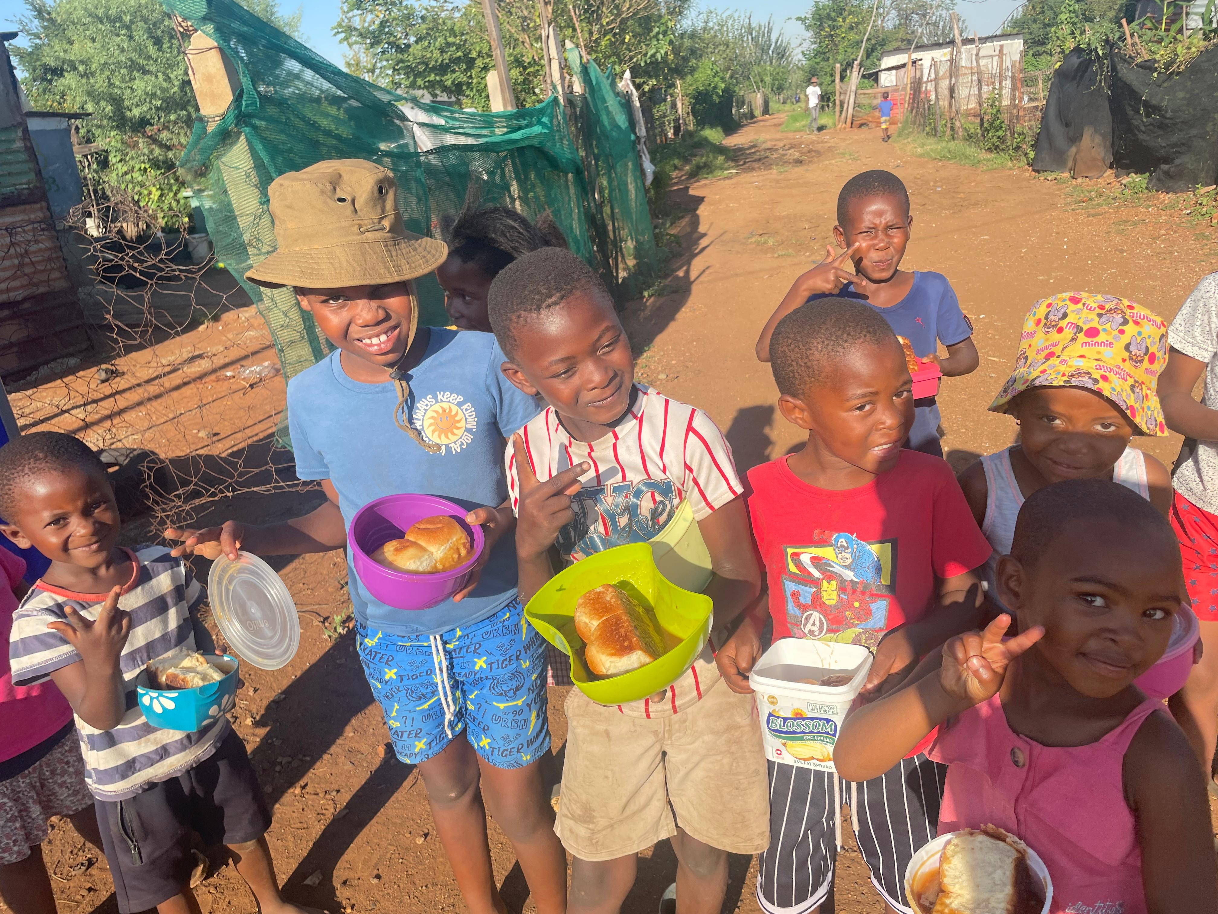 Children smiling with food
